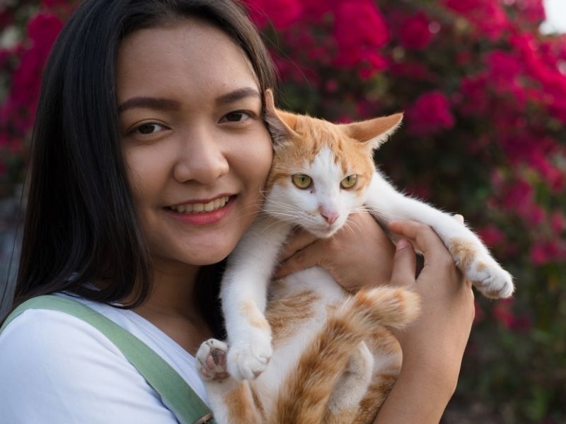 Woman holding cat